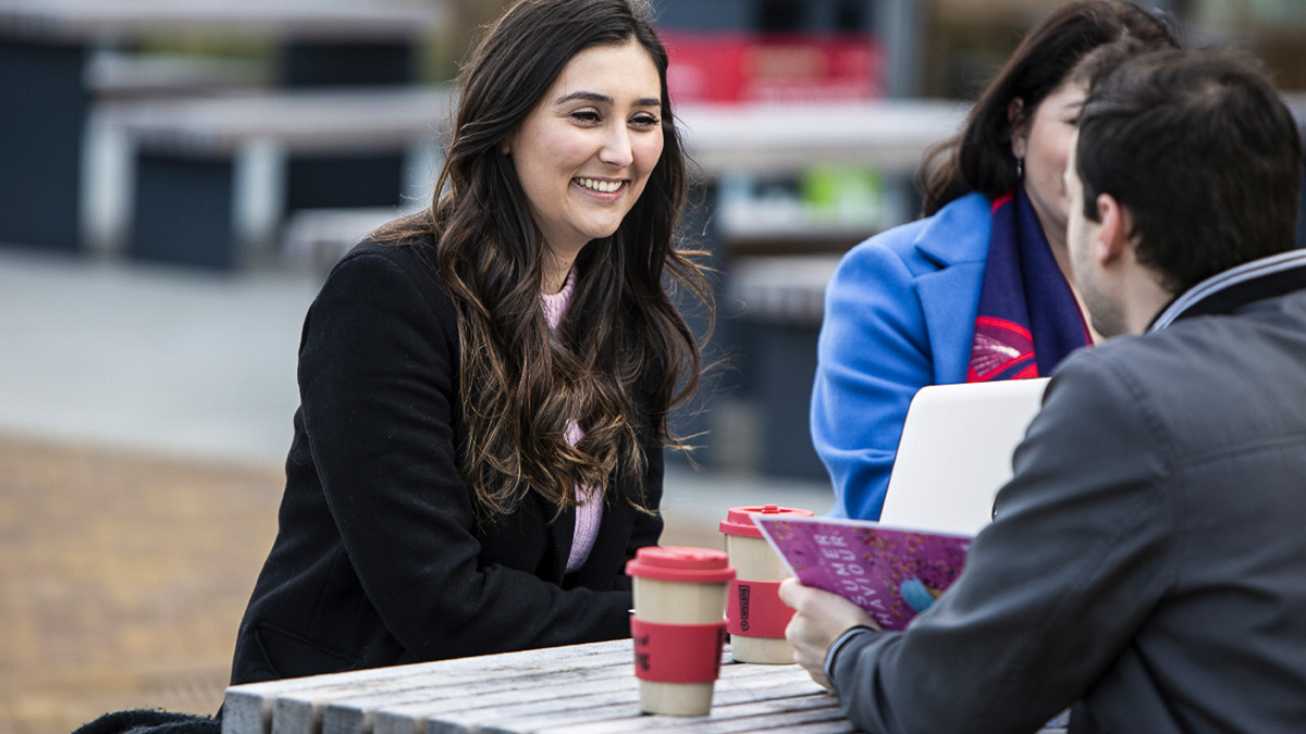 Group of students talking outside