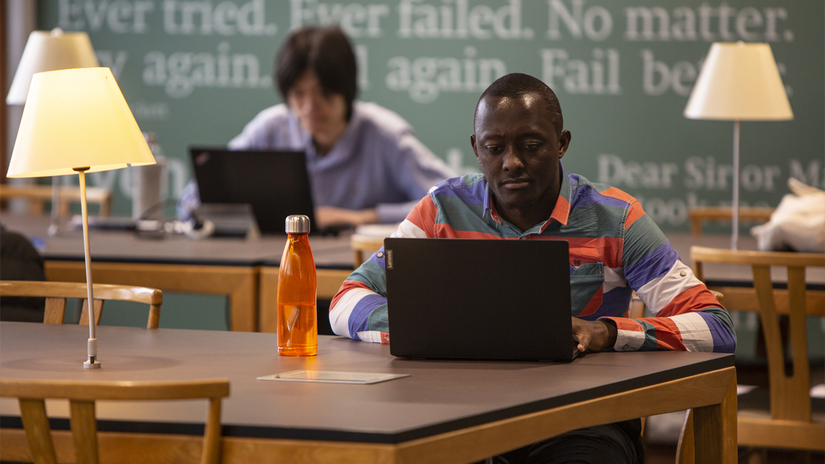 Student studying on a laptop