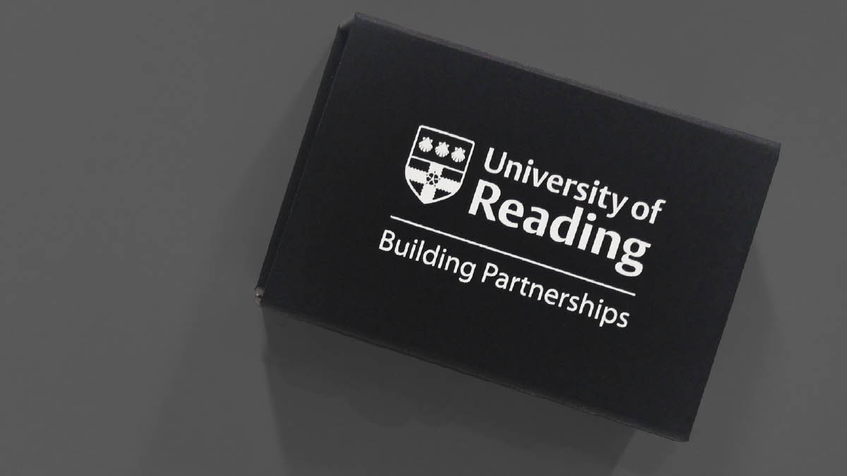 Gift box featuring the University of Reading logo and the text Building Partnerships