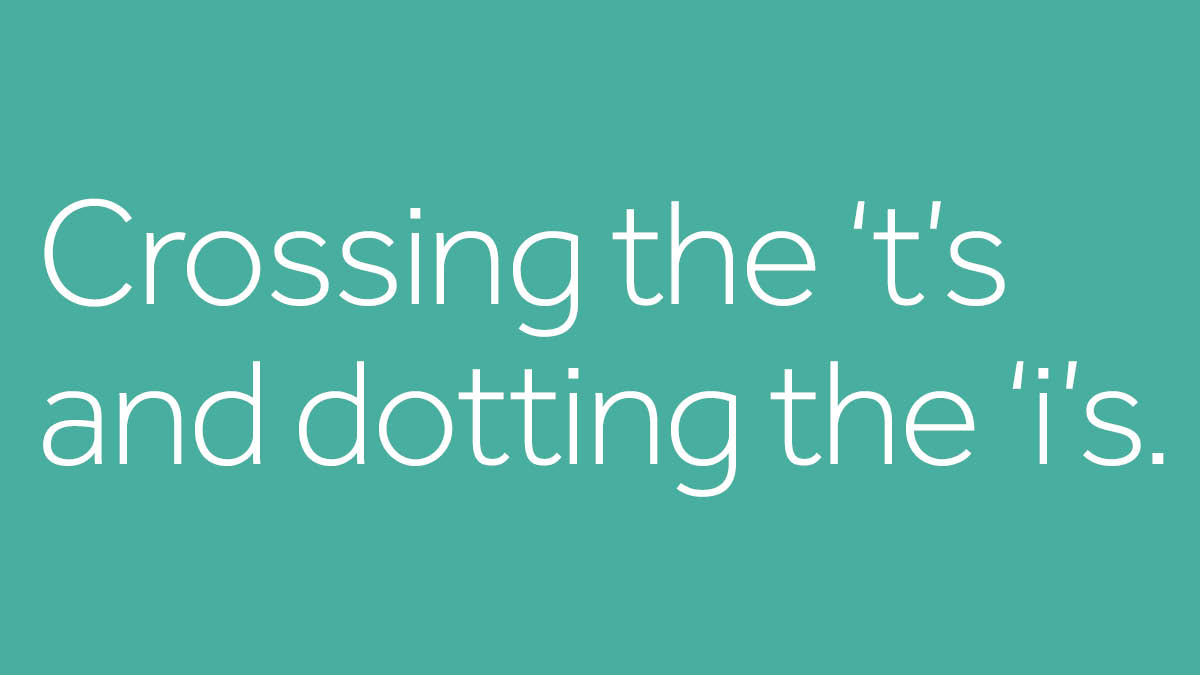 Turquoise rectangle with Crossing the Ts and dotting the Is
