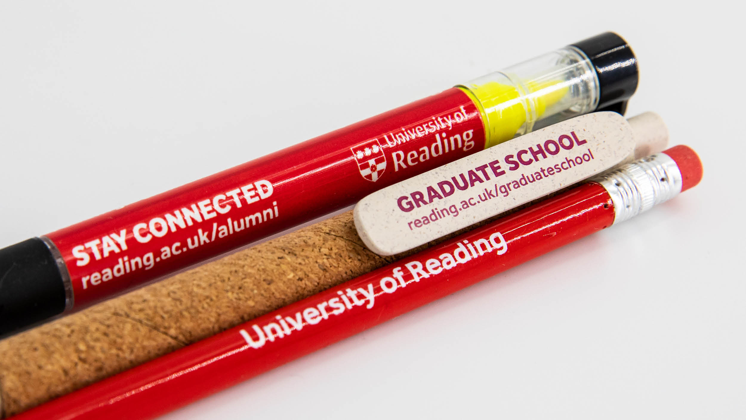 Collection of University of Reading branded pens and pencils