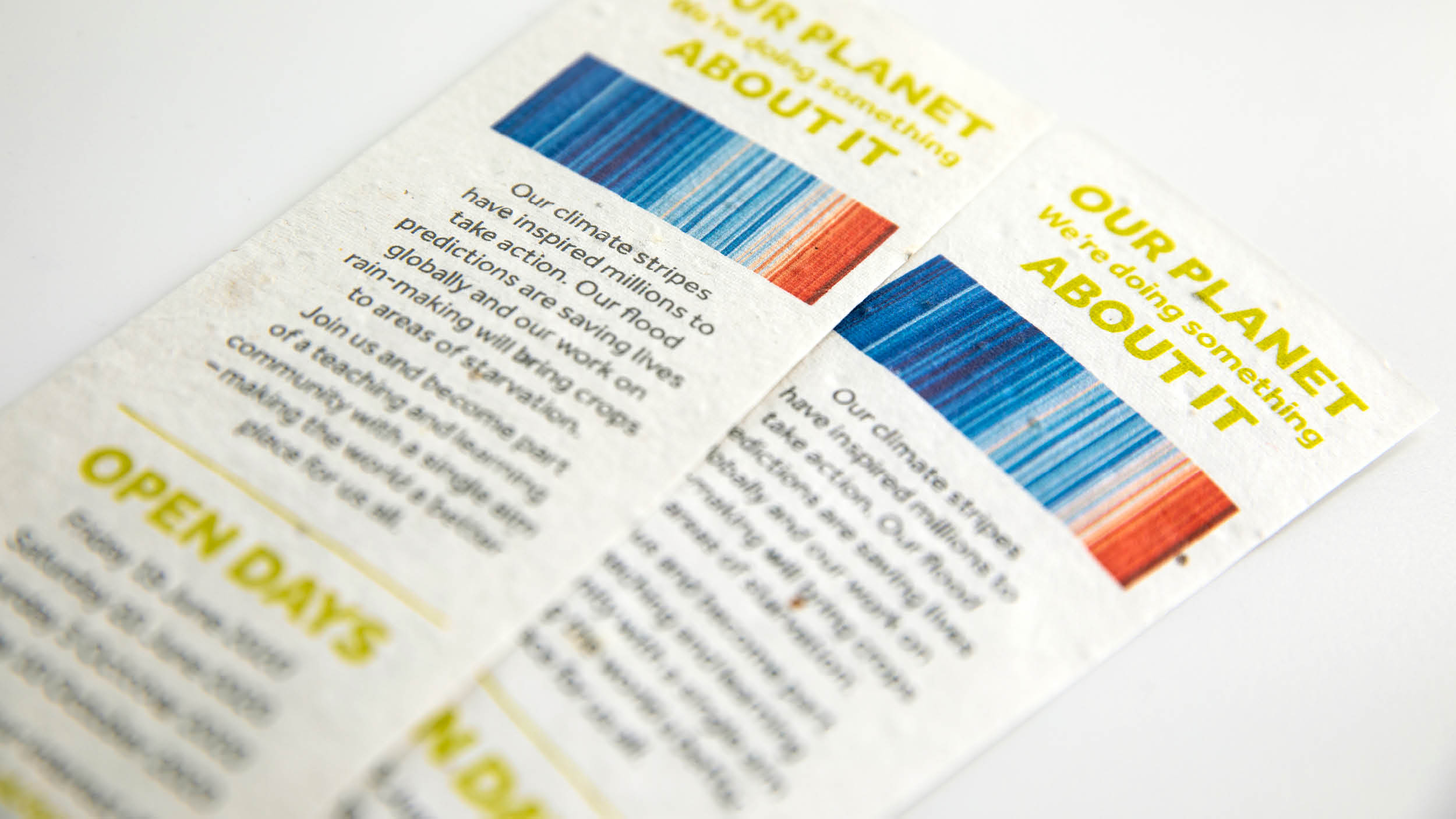 Seed paper bookmarks featuring the Climate Stripes by Professor Ed Hawkins
