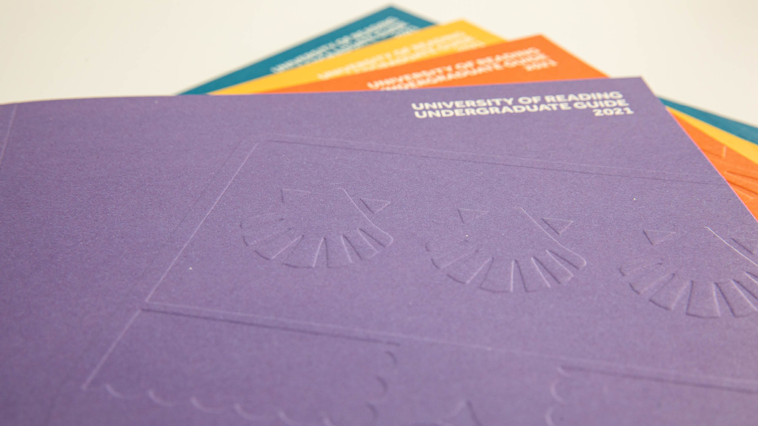 University of Reading crest shown as an emboss on the front of a prospectus