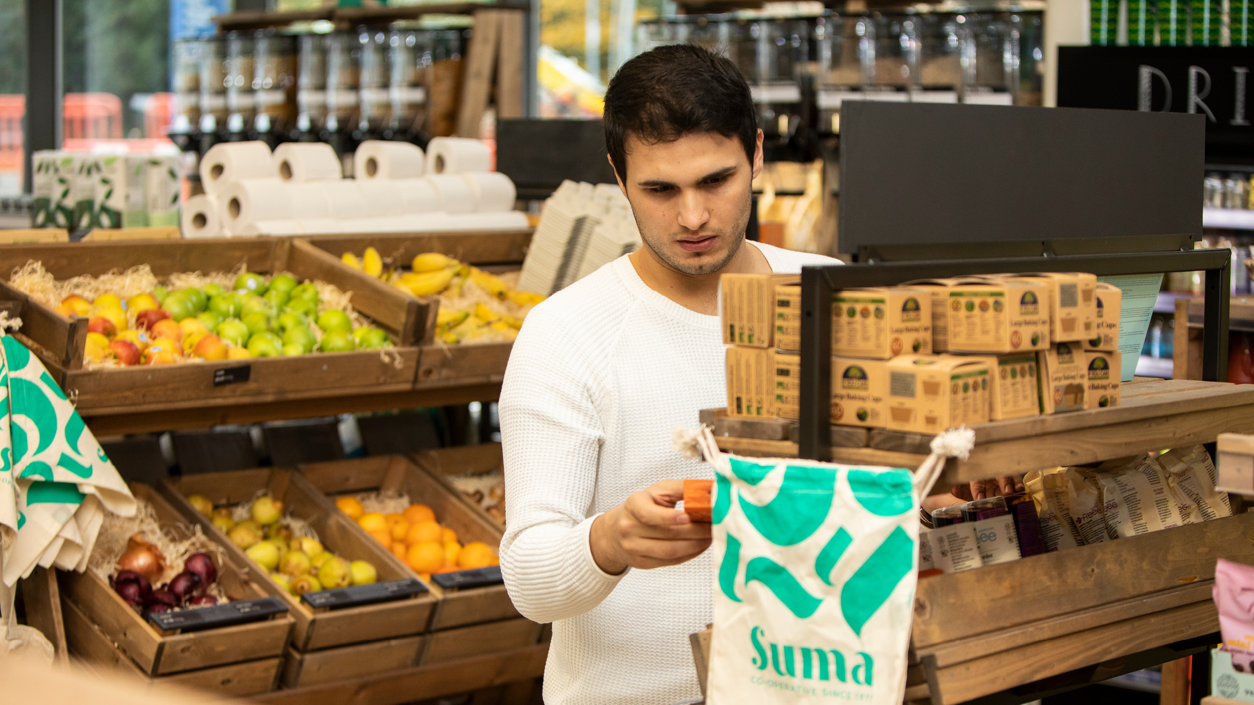 Student shops in the zero waste market on campus