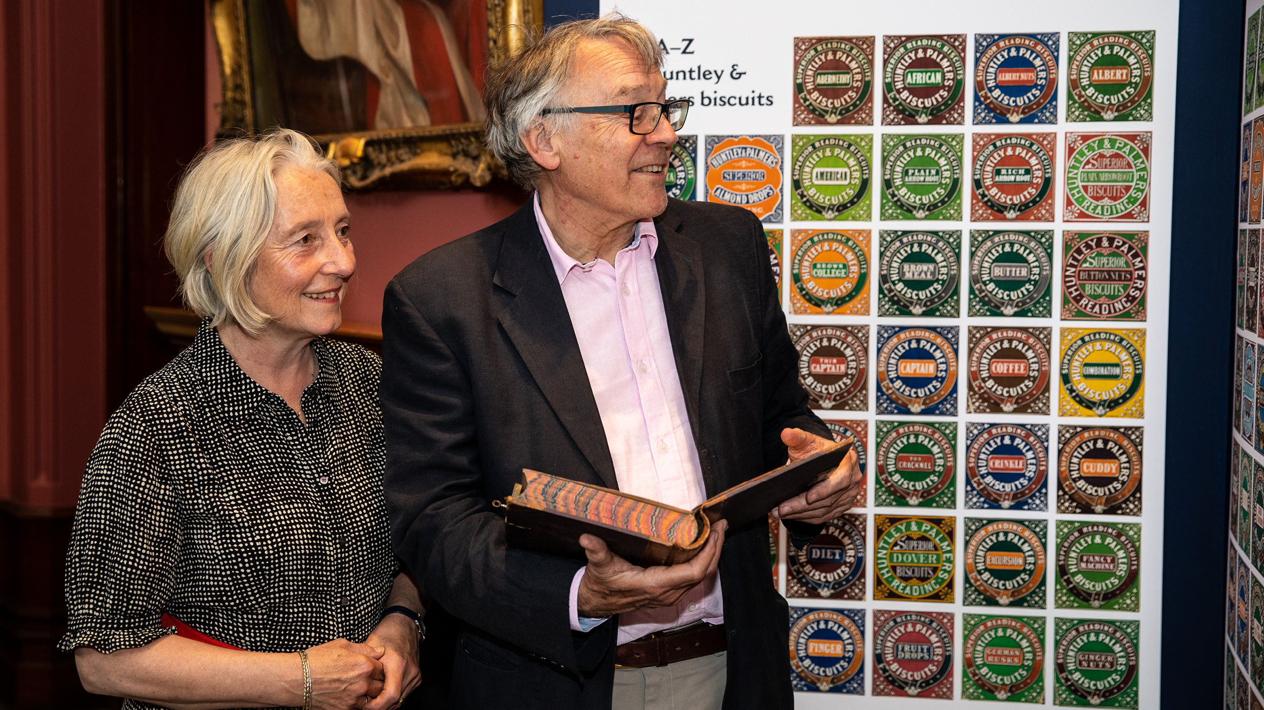 Members of the Palmer family view exhibits at the Biscuit Factory event