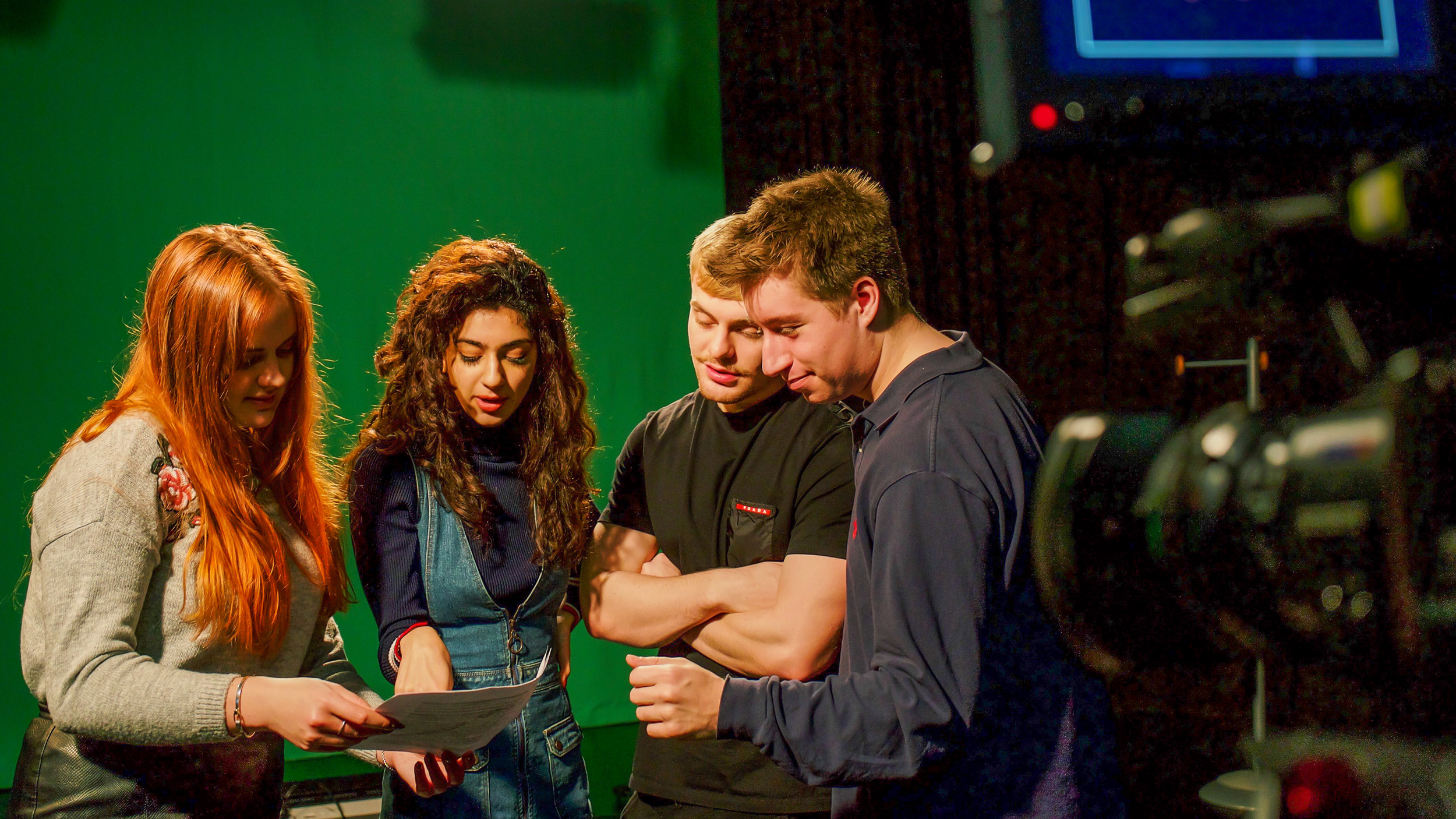 Group of students work together in the Minghella studios on Whiteknights