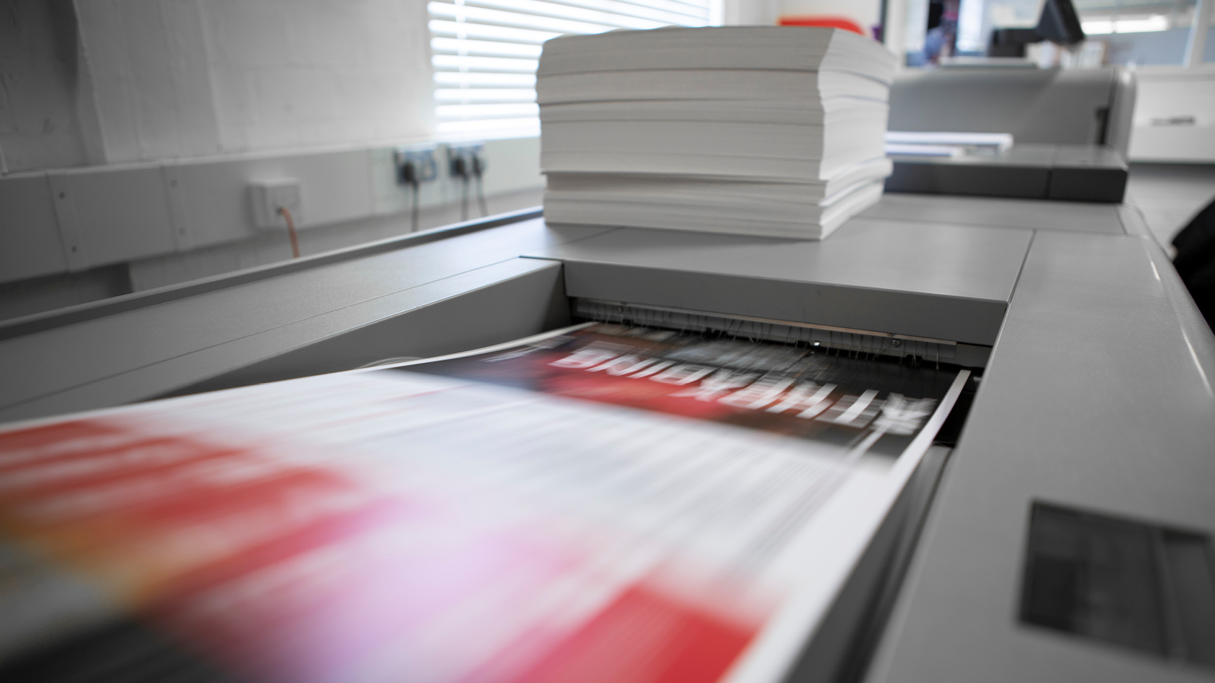 A document being printed on our in house digital press