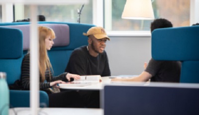 students studying together in the library