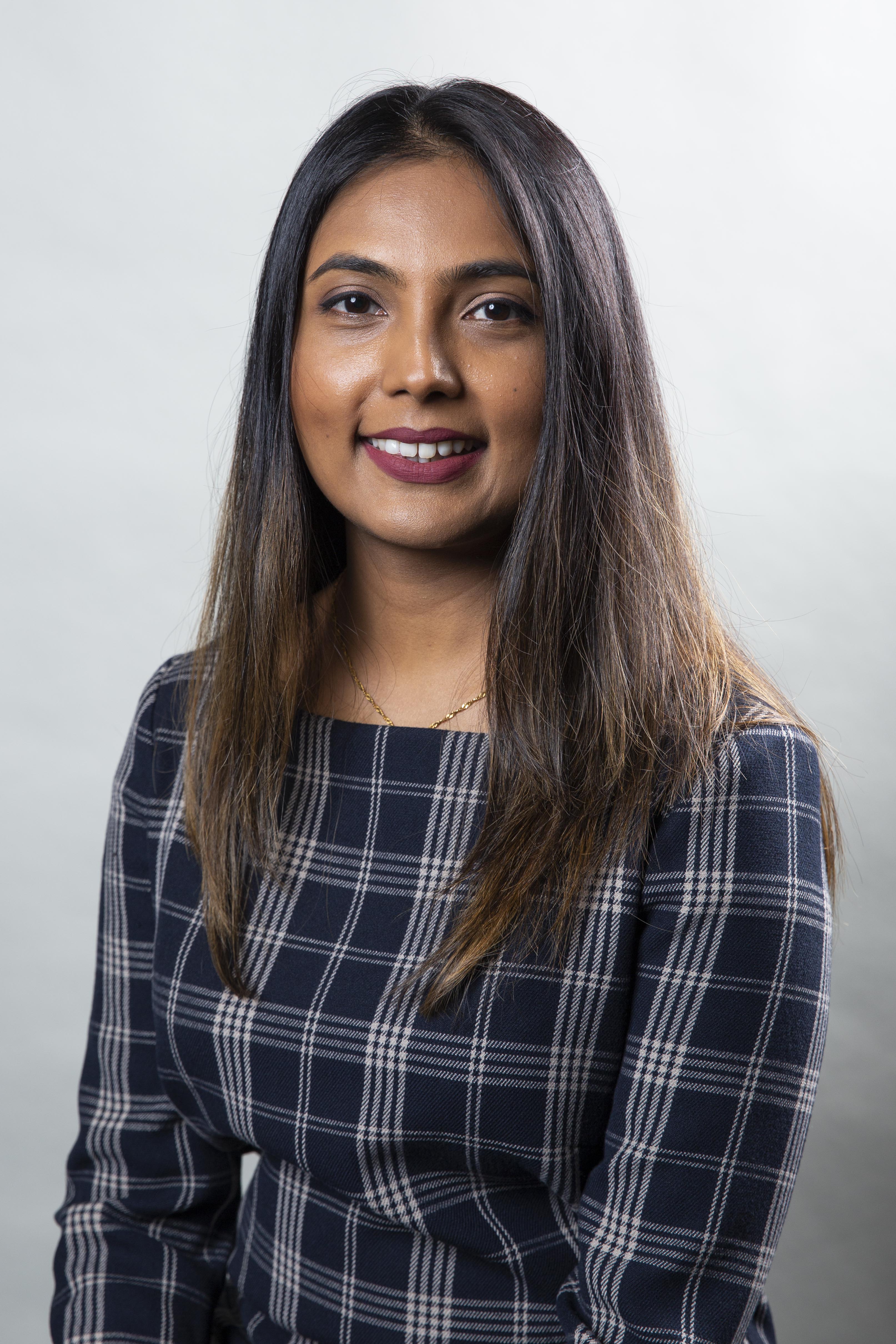 Headshot of Flavia Ghouri Stroud