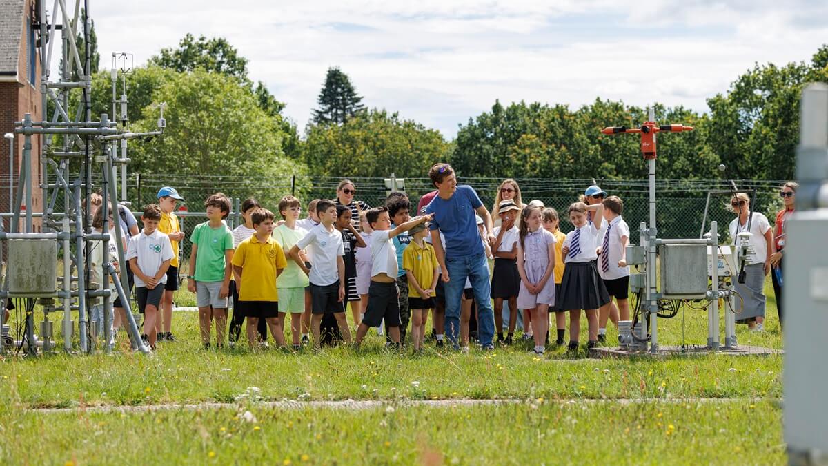 Large group of school children in a field